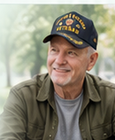 Older Veteran wearing Veteran cap — full photo in frame